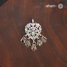 Beautiful chiali work silver pendant that comes with colourful glass stone highlights. traditional craftsmanship at its finest.