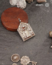 Discover the charm of traditional craftsmanship with our Devi Silver pendant.
Expertly crafted using the thapi (stamp die) technique, this pendant reflects the age-old artistry of India’s tribal communities. Known by various names like Kavach, Mandaliya, Patri, and Kathla, amulet pendants have long been cherished as symbols of passive worship—a way to keep your deity, Kuldevta, or Kuldevi close to your heart. 