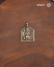 Discover the charm of traditional craftsmanship with our tribal silver pendant.Expertly crafted using the thapi (stamp die) technique, this pendant reflects the age-old artistry of India’s tribal communities. Known by various names like Kavach, Mandaliya, Patri, and Kathla, amulet pendants have long been cherished as symbols of passive worship—a way to keep your deity, Kuldevta, or Kuldevi close to your heart.