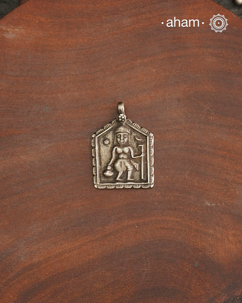 Discover the charm of traditional craftsmanship with our tribal silver pendant.Expertly crafted using the thapi (stamp die) technique, this pendant reflects the age-old artistry of India’s tribal communities. Known by various names like Kavach, Mandaliya, Patri, and Kathla, amulet pendants have long been cherished as symbols of passive worship—a way to keep your deity, Kuldevta, or Kuldevi close to your heart.