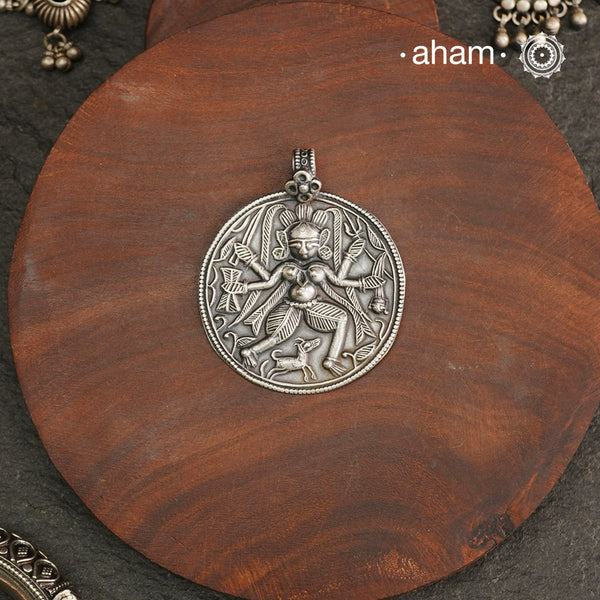 Discover the charm of traditional craftsmanship with our Silver Lord Bhairav Pendant.Expertly crafted using the thapi (stamp die) technique, this pendant reflects the age-old artistry of India’s tribal communities. Known by various names like Kavach, Mandaliya, Patri, and Kathla, amulet pendants have long been cherished as symbols of passive worship—a way to keep your deity, Kuldevta, or Kuldevi close to your heart. 