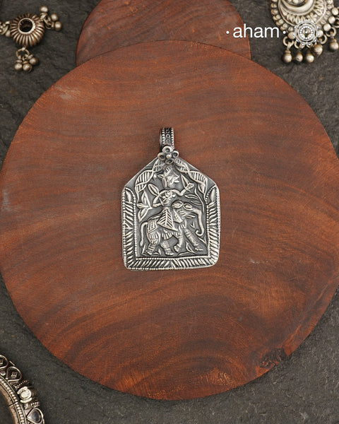 Discover the charm of traditional craftsmanship with our Handmade Lord Indra 92.5 Sterling Silver Pendant.

Expertly crafted using the thapi (stamp die) technique, this pendant reflects the age-old artistry of India’s tribal communities. Known by various names like Kavach, Mandaliya, Patri, and Kathla, amulet pendants have long been cherished as symbols of passive worship—a way to keep your deity, Kuldevta, or Kuldevi close to your heart.
