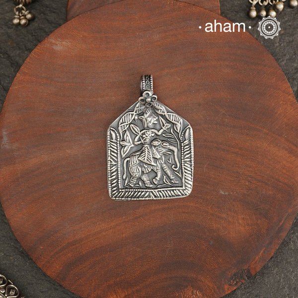 Discover the charm of traditional craftsmanship with our Handmade Lord Indra 92.5 Sterling Silver Pendant.

Expertly crafted using the thapi (stamp die) technique, this pendant reflects the age-old artistry of India’s tribal communities. Known by various names like Kavach, Mandaliya, Patri, and Kathla, amulet pendants have long been cherished as symbols of passive worship—a way to keep your deity, Kuldevta, or Kuldevi close to your heart.
