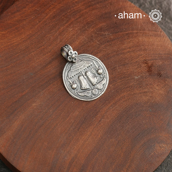 Discover the charm of traditional craftsmanship with our Vishnu Feet Tribal Silver Pendant.
Expertly crafted using the thapi (stamp die) technique, this pendant reflects the age-old artistry of India’s tribal communities. Known by various names like Kavach, Mandaliya, Patri, and Kathla, amulet pendants have long been cherished as symbols of passive worship—a way to keep your deity, Kuldevta, or Kuldevi close to your heart.