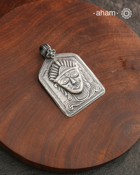 Discover the charm of traditional craftsmanship with our Handmade Lord Surya 92.5 Sterling Silver Pendant.Expertly crafted using the thapi (stamp die) technique, this pendant reflects the age-old artistry of India’s tribal communities. Known by various names like Kavach, Mandaliya, Patri, and Kathla, amulet pendants have long been cherished as symbols of passive worship—a way to keep your deity, Kuldevta, or Kuldevi close to your heart. 