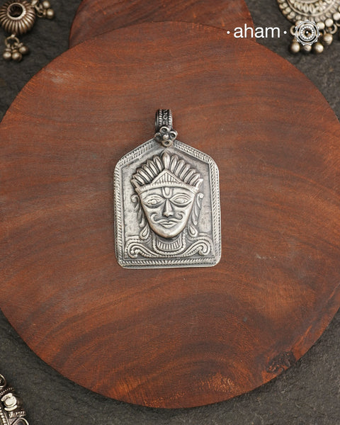 Discover the charm of traditional craftsmanship with our Handmade Lord Surya 92.5 Sterling Silver Pendant.Expertly crafted using the thapi (stamp die) technique, this pendant reflects the age-old artistry of India’s tribal communities. Known by various names like Kavach, Mandaliya, Patri, and Kathla, amulet pendants have long been cherished as symbols of passive worship—a way to keep your deity, Kuldevta, or Kuldevi close to your heart. 