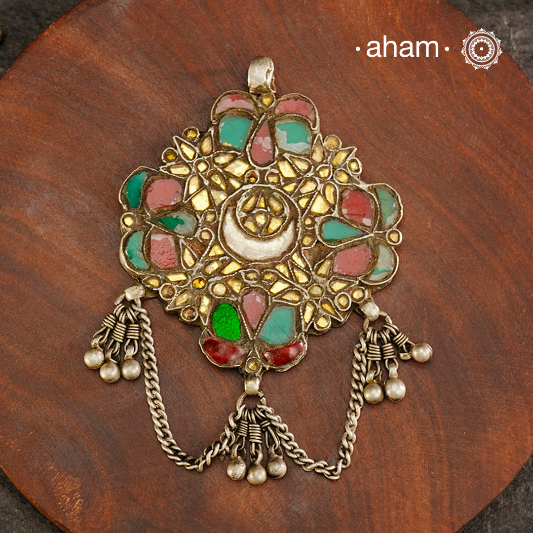 Beautiful handcrafted tribal silver glass pendant from a bygone area, that bring back memories and stories of that time. Wear it with a long chain or with a black thread, or layer them to create a distinct look. 