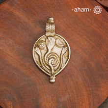 Tribal Silver Snake Pendant, a beautifully handcrafted tribal silver pendant from a bygone area, that bring back memories and stories of that time. Wear it with a long chain or with a black thread, or layer them to create a distinct look. This Amulet reflects a beautiful blend of faith and craftsmanship — a perfect representation of heritage jewellery.