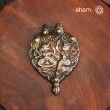 Tribal Silver Ganesh Lakshmi Pendant, a Beautifully handcrafted tribal silver amulet pendant from a bygone area, that bring back memories and stories of that time. Wear it with a long chain or with a black thread, or layer them to create a distinct look. This Amulet reflects a beautiful blend of faith and craftsmanship — a perfect representation of heritage jewellery.