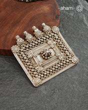 Representative of a traditional Indian home, this vintage House amulet is an architectural pendant that represents shelter, stability, and divine presence within the home. Represented by a walled-in Square and a center courtyard along with ornate decorations, it is a powerful symbol of family unity and protection. This pendant is hand crafted in silver This Beautiful handcrafted tribal silver amulet pendant from a bygone area brings back memories and stories of that time.