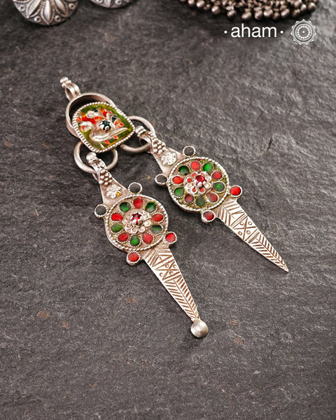 "Vintage Silver Pendant. Trivia: This is actually a tooth digger and a ear cleaner.&nbsp;
a utilitarian piece of jewellery. This form of jewellery is popular across south east asian countries.&nbsp;"