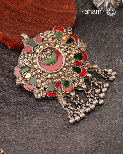 Beautiful handcrafted tribal silver glass pendant from a bygone area, that bring back memories and stories of that time.Wear it with a long chain or with a black thread, or layer them to create a distinct look.