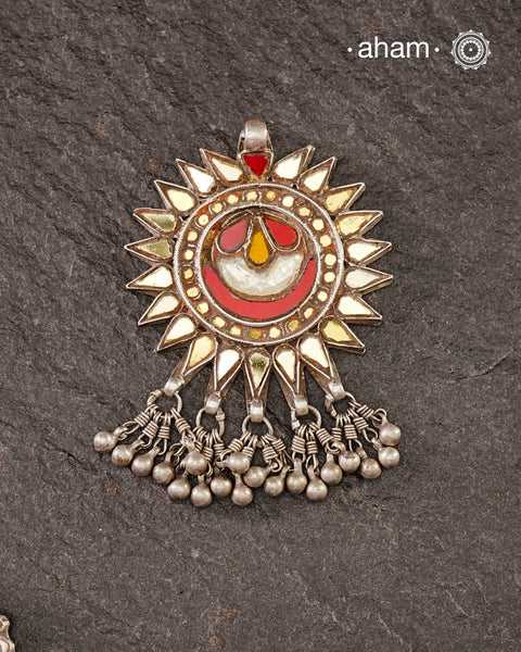 Beautiful handcrafted tribal silver glass pendant from a bygone area, that bring back memories and stories of that time.Wear it with a long chain or with a black thread, or layer them to create a distinct look.