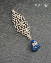 One of a kind pendant where we have used a vintage silver piece along with lapiz drop with inlay work. Wear it with a long chain or a thread.