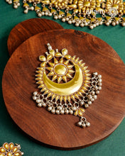 Enhance your style with the timeless elegance of the Dual Tone Silver Pendant. Handcrafted by skilled karigars in Barmer, Rajasthan, this neckpiece features traditional Bandhel work, where a thin sheet of hand beaten&nbsp;22 carat gold is set on 92.5 silver using a unique wax setting technique. A classic representation of fine Indian traditional craftsmanship.&nbsp;

Chain not included