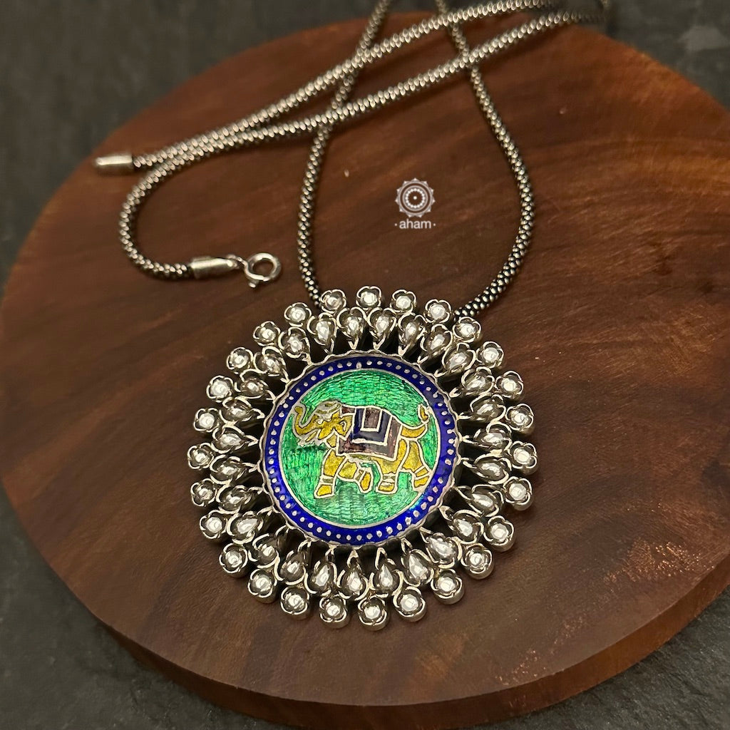 Handcrafted pendant with vibrant Meenakari work. Crafted in 92.5 sterling silver.
Please note that the chain is not included with the pendant.