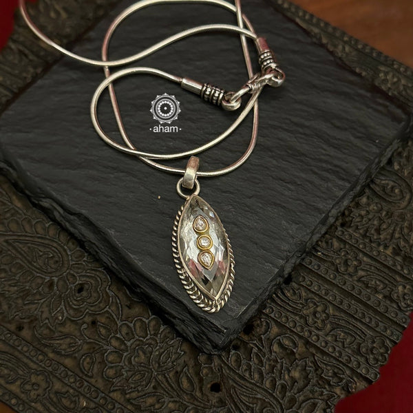 A beautiful gold ascent on a clear quartz, encased in silver.  Wear the pendant long or short with a chain of your choice, or a smart silver Hasli.  A piece so timeless you will enjoy wearing over the years to come. Please note, each piece created in this series is unique and one of a kind. (Does not include chain)