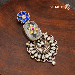 Ira stone pendant with intricate floral inlay work in semi precious stone setting, crafted in 92.5 silver. Wear it long or short with a chain of your choice, or a smart silver Hasli. A piece so timeless that it can we worn across generations. Please note, each piece created in this series is unique and one of a kind.
(Does not include chain)