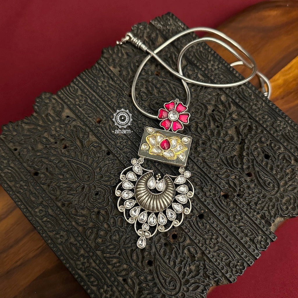 Handmade ira stone pendant with Mughal Inspired intricate floral inlay work in semi precious stone setting, encased in silver. Wear it long or short with a chain of your choice, or a smart silver Hasli. A piece so timeless that it can we worn across generations. Please note, each piece created in this series is unique and one of a kind. (Does not include chain)