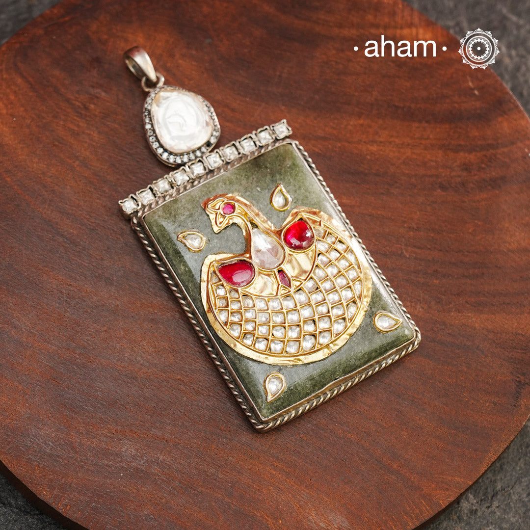 Handmade ira stone pendant with intricate inlay work in semi precious stone setting, handcrafted in 92.5 silver Wear it long or short with a chain of your choice, or a smart silver Hasli. A piece so timeless that it can we worn across generations. Please note, each piece created in this series is unique and one of a kind.
(Does not include chain)