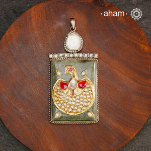 Handmade ira stone pendant with intricate inlay work in semi precious stone setting, handcrafted in 92.5 silver Wear it long or short with a chain of your choice, or a smart silver Hasli. A piece so timeless that it can we worn across generations. Please note, each piece created in this series is unique and one of a kind.
(Does not include chain)