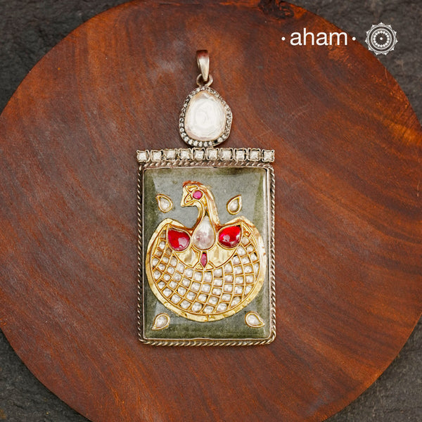 Handmade ira stone pendant with intricate inlay work in semi precious stone setting, handcrafted in 92.5 silver Wear it long or short with a chain of your choice, or a smart silver Hasli. A piece so timeless that it can we worn across generations. Please note, each piece created in this series is unique and one of a kind.
(Does not include chain)