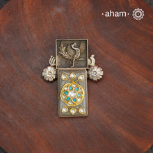 Handmade ira stone pendant with intricate floral inlay work in semi precious stone setting, encased in silver. Wear it long or short with a chain of your choice, or a smart silver Hasli. A piece so timeless that it can we worn across generations. Please note, each piece created in this series is unique and one of a kind.
(Does not include chain)