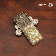 Handmade ira stone pendant with intricate floral inlay work in semi precious stone setting, encased in silver. Wear it long or short with a chain of your choice, or a smart silver Hasli. A piece so timeless that it can we worn across generations. Please note, each piece created in this series is unique and one of a kind.
(Does not include chain)