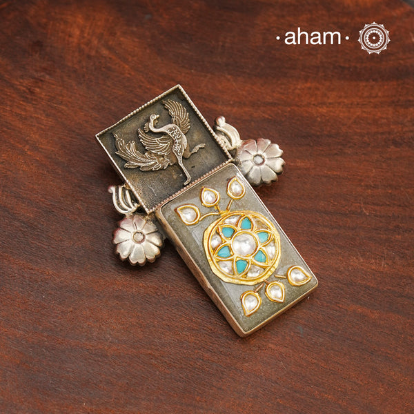 Handmade ira stone pendant with intricate floral inlay work in semi precious stone setting, encased in silver. Wear it long or short with a chain of your choice, or a smart silver Hasli. A piece so timeless that it can we worn across generations. Please note, each piece created in this series is unique and one of a kind.
(Does not include chain)