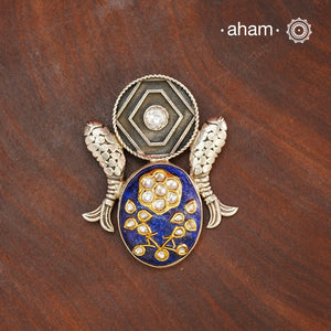Handmade Ira stone pendant with Mughal Inspired intricate floral inlay work in semi precious stone setting, encased in silver. Wear it long or short with a chain of your choice, or a smart silver Hasli. A piece so timeless that it can we worn across generations. Please note, each piece created in this series is unique and one of a kind.
(Does not include chain)