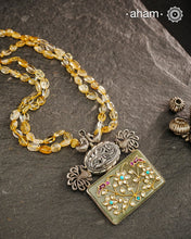 Handmade pendant with Mughal Inspired intricate floral inlay work in semi precious stone setting. Comes with semi precious stone beads A piece so timeless that it can we worn across generations.