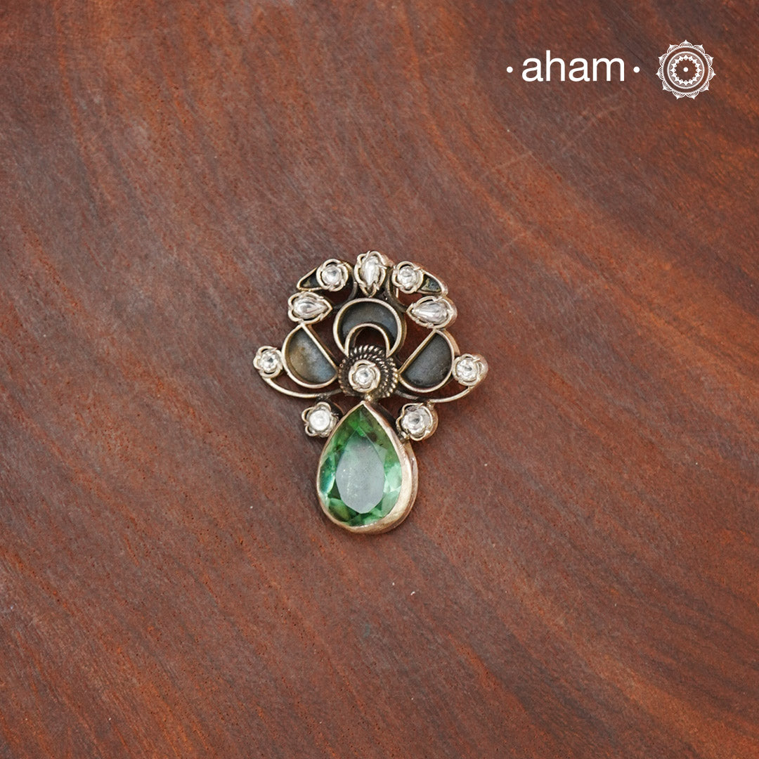 Expertly crafted from 92.5 silver, the Ira Stone Silver Pendant features a stunning ira stone drop. Elevate your style with this elegant and timeless piece.