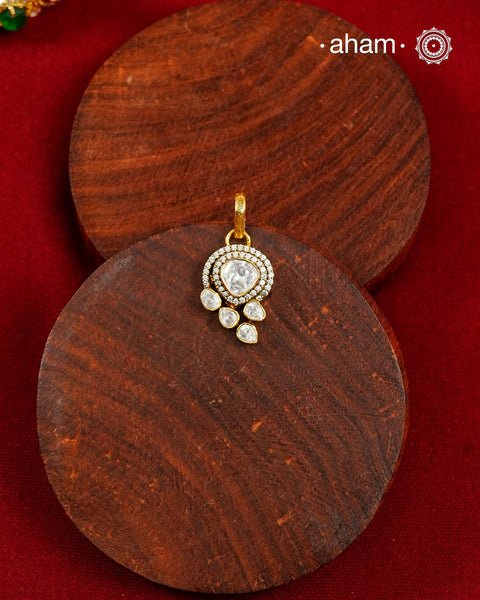 Brilliant moissanites come together in a graceful arrangement to create this elegant pendant. Crafted in 92.5 silver with a rich gold polish, it offers exceptional sparkle and timeless versatility. A beautiful choice for everyday celebrations.