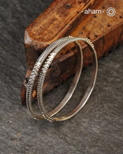 Handcrafted 92.5 Silver Bangles with rava work. Perfect for everyday wear.