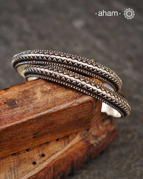 Handcrafted 92.5 Silver Bangles with rava work perfect for everyday wear.