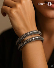 Handcrafted Silver Bangles with rava work perfect for everyday wear. 