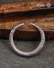 Twist and wear silver hand beaten texture kada crafted in 92.5 sterling silver. Statement pieces which are a must have in every jewellery lovers collection.  The price is for one piece  only. 