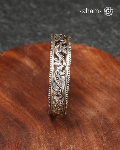 Handcrafted 92.5 sterling silver bangles with floral work.
Comes as a single piece.