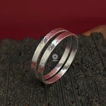 Classic plain silver bangles with beautiful beaten texture crafted in 92.5 silver. 