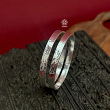 Classic plain silver bangles with beautiful beaten texture crafted in 92.5 silver. 