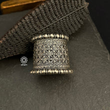 The Mewad Silver Handcuff (Open Cuff) features classic Chitai work from Rajasthan, meticulously crafted in 92.5% sterling silver. The cuff is adorned entirely with Chitai work, known for its intricate and detailed engraving, merging traditional artistry with contemporary style.