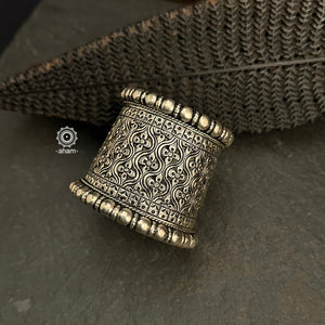 The Mewad Silver Handcuff (Open Cuff) features classic Chitai work from Rajasthan, meticulously crafted in 92.5% sterling silver. The cuff is adorned entirely with Chitai work, known for its intricate and detailed engraving, merging traditional artistry with contemporary style.