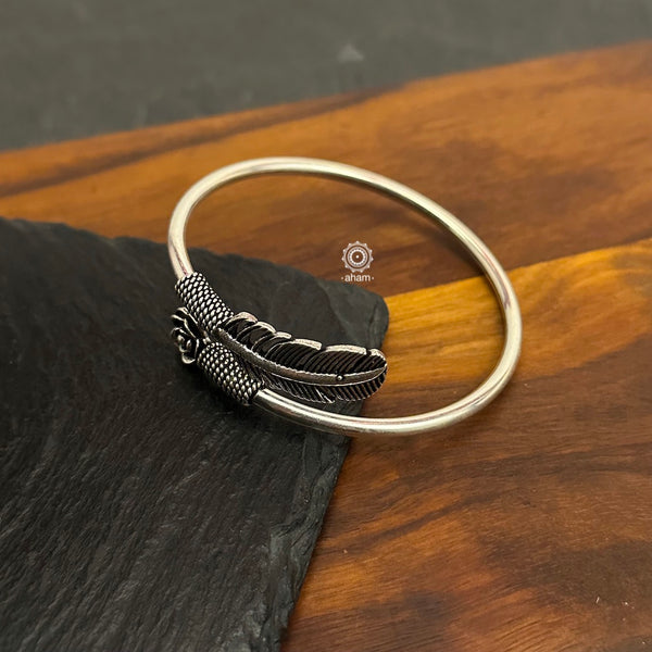 Handcrafted twist and wear bracelets in 92.5 sterling silver with beautiful leaf & rose motifs. Statement accessory which look great paired with your watches or even by itself. The price is for one piece kada only. 