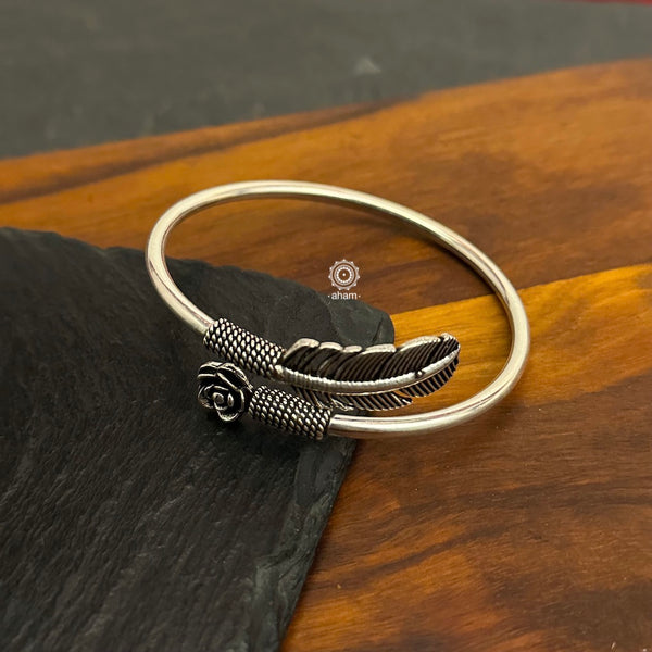 Handcrafted twist and wear bracelets in 92.5 sterling silver with beautiful leaf & rose motifs. Statement accessory which look great paired with your watches or even by itself. The price is for one piece kada only. 