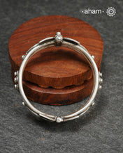 Handcrafted 92.5 silver kada with beautiful tar work and kemp stones embellishments. The price is for one piece kada only.