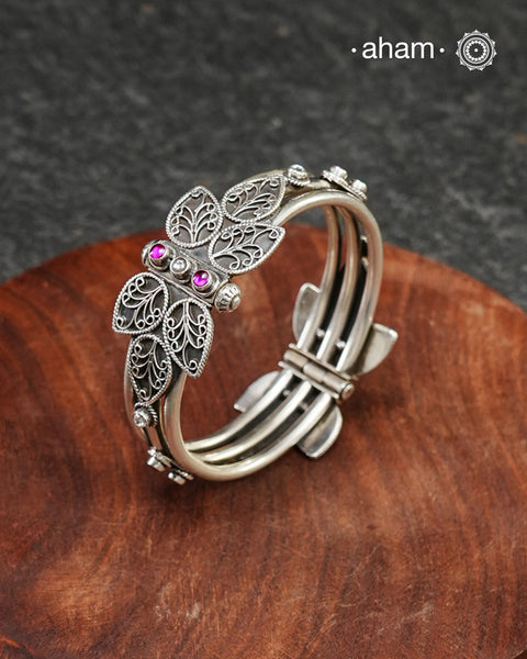 Handcrafted 92.5 silver kada with beautiful tar work and kemp stones embellishments.&nbsp;The price is for one piece kada only.