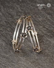 Handcrafted 92.5 sterling silver bangles with roses. 