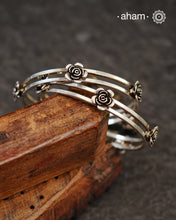 Handcrafted 92.5 sterling silver bangles with roses. 