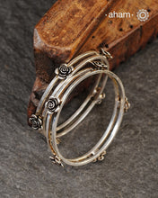 Handcrafted 92.5 sterling silver bangles with roses. 