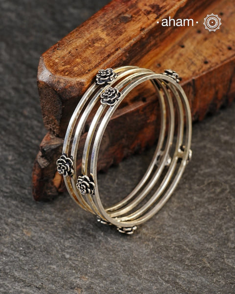 Handcrafted 92.5 sterling silver bangles with roses.